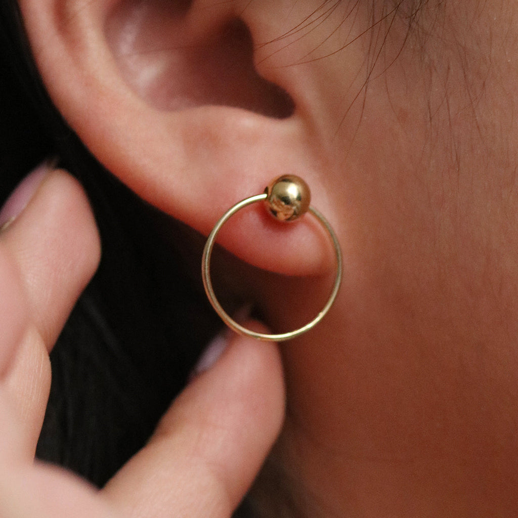 Ball with line circle earrings